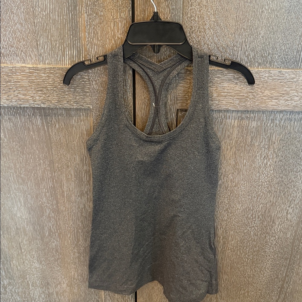 Lululemon size 6 Racerback Tank Top. Dark gray Worn once looks/feels brand new